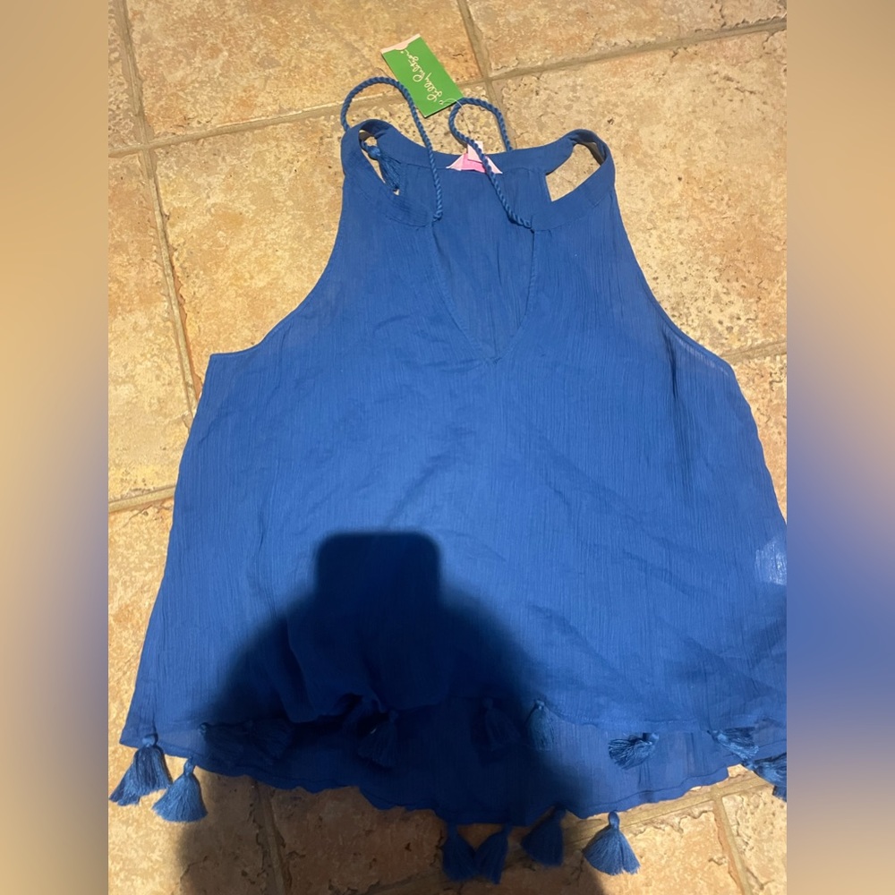 Lilly Pulitzer blue Roxy top size Large. Has pretty tassels. NWT